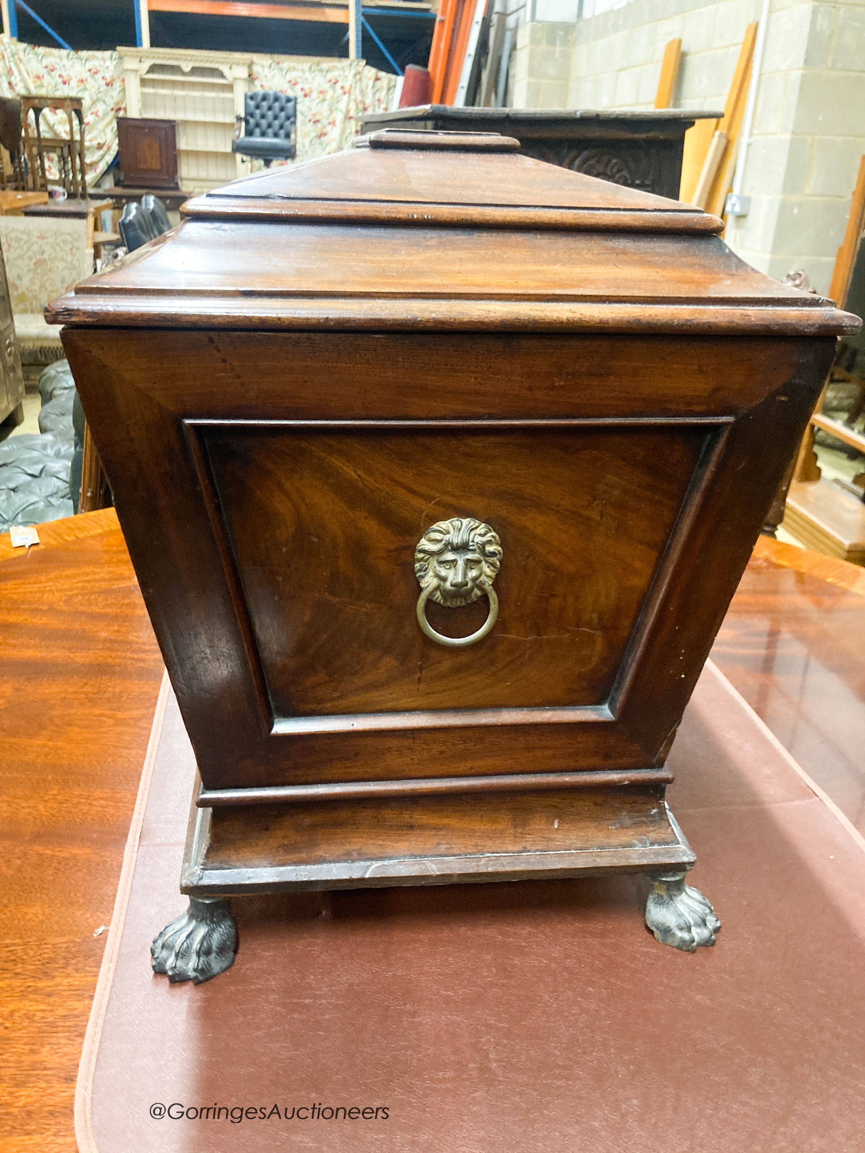 A late Regency mahogany sarcophagus cellarette, width 59cm, depth 43cm, height 50cm